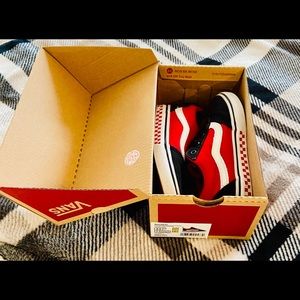 Toddler vans almost new still in box.